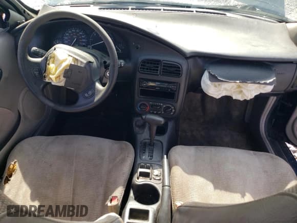 ✅ 2001 Saturn SC • VIN: 1G8ZP12891Z314605 • Лот: 51488595. Опубликован ранее на Copart с пробегом 220 219 миль. Бесплатный доступ к архиву аукционных продаж из США и подробный отчёт об истории автомобиля на DreamBid. Изображение 8.