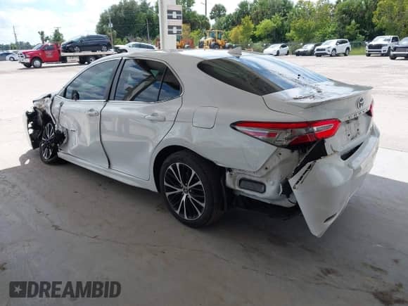 2019 Toyota Camry LE with VIN 4T1B11HK9KU798832, listed as a IAAI auction lot 43198815 with 85,282 mi miles and . Bid and sale history available at DreamBid. Image 3.