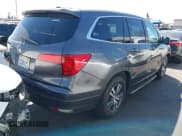 ✅ 2017 Honda Pilot EX-L • VIN: 5FNYF5H59HB030884 • Lot: 43118488. Listed on IAAI with 69,489 mi. Free auction sales archive from the USA and detailed vehicle history report at DreamBid. Image 4.