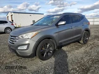✅ 2014 Hyundai Santa Fe • VIN: 5XYZWDLA0EG130251 • Лот: 87264035. Опубликован ранее на Copart с пробегом 146 001 миль. Бесплатный доступ к архиву аукционных продаж из США и подробный отчёт об истории автомобиля на DreamBid. Изображение 1.