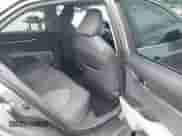 2022 Toyota Camry LE with VIN 4T1C11AK0NU653830, listed as a IAAI auction lot 43428154 with 21,960 mi miles and . Bid and sale history available at DreamBid. Image 8.