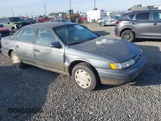 ✅ 1993 Ford Taurus GL • VIN: 1FALP5240PG327124 • Lot: 42074204. Listed on IAAI with 27,681 mi. Free auction sales archive from the USA and detailed vehicle history report at DreamBid. Image 1.