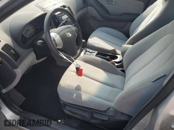 2009 Hyundai Elantra GLS z VIN KMHDU46D49U594519, wystawiony jako Copart lot #71169994 z przebiegiem 96 875 mil mil oraz Szkoda całkowita • Salvage title. Historia ofert i sprzedaży dostępna na DreamBid. Obrazek 7.