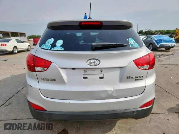 2013 Hyundai Tucson GLS with VIN KM8JU3AC7DU566198, listed as a Copart auction lot 71479605 with 196,474 mi miles and Salvage title. Bid and sale history available at DreamBid. Image 6.