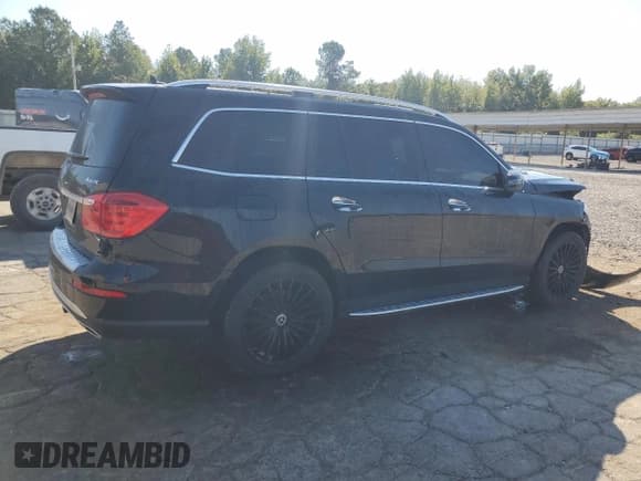 ✅ 2015 Mercedes-Benz GL 450 • VIN: 4JGDF6EEXFA613250 • Lot: 84223395. Listed on Copart with 151,958 mi. Free auction sales archive from the USA and detailed vehicle history report at DreamBid. Image 3.