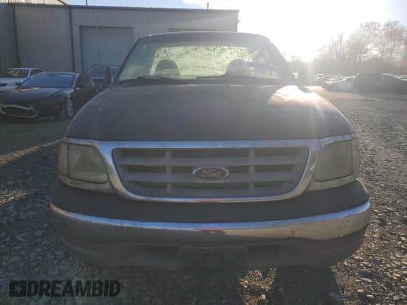 ✅ 2003 Ford F-150 XL • VIN: 1FTRF182X3NA77709 • Lot: 91856995. Listed on Copart with Not provided. Free auction sales archive from the USA and detailed vehicle history report at DreamBid. Image 5.