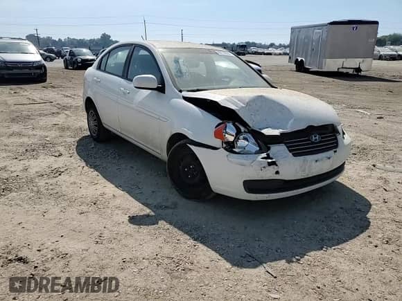 2010 Hyundai Accent GLS z VIN KMHCN4AC2AU480451, wystawiony jako Copart lot #69716034 z przebiegiem 162 717 mil mil oraz Szkoda całkowita • Salvage title. Historia ofert i sprzedaży dostępna na DreamBid. Obrazek 11.