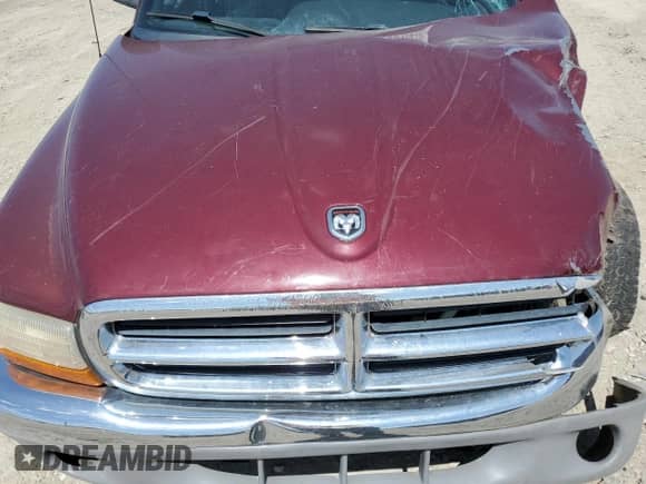 2000 Dodge Dakota Sport z VIN 1B7GG26N5YS546673, wystawiony jako Copart lot #54512715 z przebiegiem 140 904 mil mil oraz Czysty tytuł • Clean title. Historia ofert i sprzedaży dostępna na DreamBid. Obrazek 11.