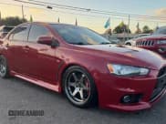 ✅ 2015 Mitsubishi Lancer Evolution GSR • VIN: JA32W8FV5FU026599 • Лот: 79051554. Опубликован ранее на Copart с пробегом 82 279 миль. Бесплатный доступ к архиву аукционных продаж из США и подробный отчёт об истории автомобиля на DreamBid. Изображение 1.