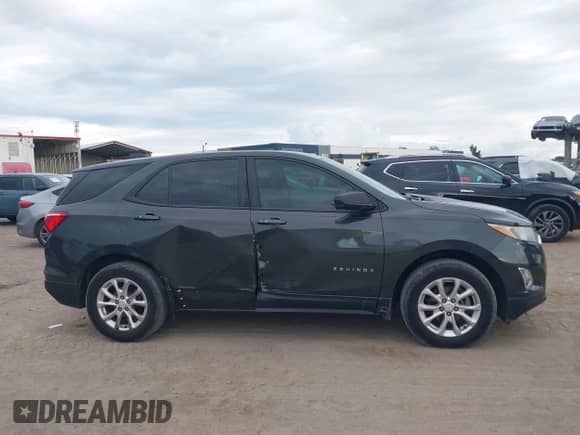 ✅ 2018 Chevrolet Equinox LS • VIN: 2GNAXHEV8J6105629 • Lot: 43307488. Listed on IAAI with 159,507 mi. Free auction sales archive from the USA and detailed vehicle history report at DreamBid. Image 14.