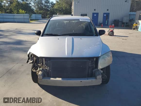 2011 Dodge Caliber Heat with VIN 1B3CB5HA1BD214462, listed as a Copart auction lot 75394274 with 176,495 mi miles and Salvage title. Bid and sale history available at DreamBid. Image 5.