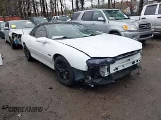 2002 Chevrolet Camaro Z28 z VIN 2G1FP22G222151301, wystawiony jako IAAI lot #41795113 z przebiegiem 164 931 mil mil oraz . Historia ofert i sprzedaży dostępna na DreamBid. Obrazek 1.