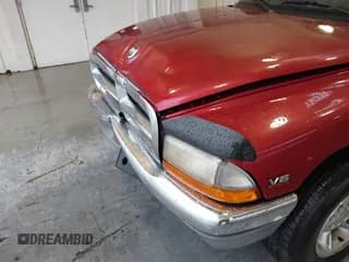✅ 1999 Dodge Dakota SLT • VIN: 1B7GL22X9XS165748 • Lot: 42242480. Wystawiony na IAAI z przebiegiem 103 319 mil. Bezpłatny archiwum sprzedaży aukcyjnych z USA i szczegółowy raport historii pojazdu na DreamBid. Zdjęcie 6.