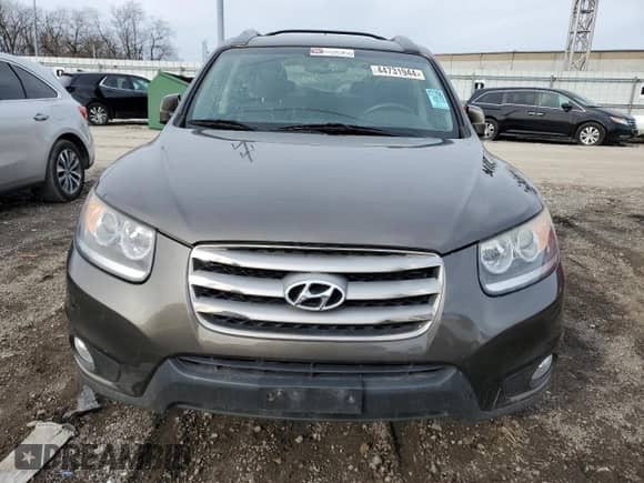 2012 Hyundai Santa Fe SE z VIN 5XYZHDAG8CG151041, wystawiony jako Copart lot #44731944 z przebiegiem 154 747 mil mil oraz Czysty tytuł • Clean title. Historia ofert i sprzedaży dostępna na DreamBid. Obrazek 5.