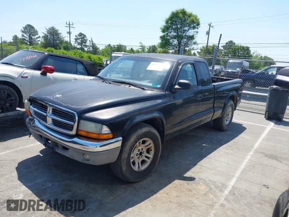 ✅ 2004 Dodge Dakota SLT • VIN: 1D7GL42N14S527342 • Lot: 42081956. Listed on IAAI with 165,157 mi. Free auction sales archive from the USA and detailed vehicle history report at DreamBid. Image 2.