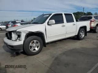 ✅ 2012 Chevrolet Colorado 1LT • VIN: 1GCDSCFEXC8142572 • Лот: 82356175. Опубликован ранее на Copart с пробегом 223 436 миль. Бесплатный доступ к архиву аукционных продаж из США и подробный отчёт об истории автомобиля на DreamBid. Изображение 1.