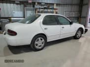 ✅ 1997 Nissan Altima XE • VIN: 1N4BU31D2VC153538 • Lot: 92502105. Listed on Copart with 146,779 mi. Free auction sales archive from the USA and detailed vehicle history report at DreamBid. Image 3.