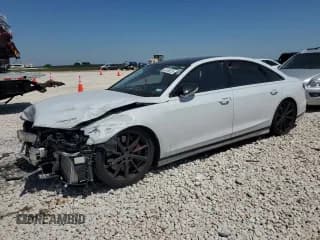 ✅ 2023 Audi S8 • VIN: WAULSAF82PN010629 • Лот: 52335825. Опубликован ранее на Copart с пробегом 20 537 миль. Бесплатный доступ к архиву аукционных продаж из США и подробный отчёт об истории автомобиля на DreamBid. Изображение 1.