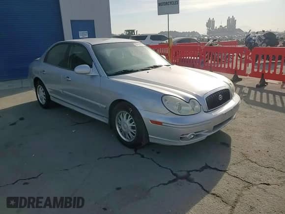 2004 Hyundai Sonata z VIN KMHWF25S04A039620, wystawiony jako Copart lot #84199634 z przebiegiem 227 690 mil mil oraz Szkoda całkowita • Salvage title. Historia ofert i sprzedaży dostępna na DreamBid. Obrazek 11.