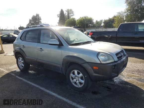 2005 Hyundai Tucson GLS z VIN KM8JN12D95U093916, wystawiony jako Copart lot #76326214 z przebiegiem 159 295 mil mil oraz Szkoda całkowita • Salvage title. Historia ofert i sprzedaży dostępna na DreamBid. Obrazek 4.