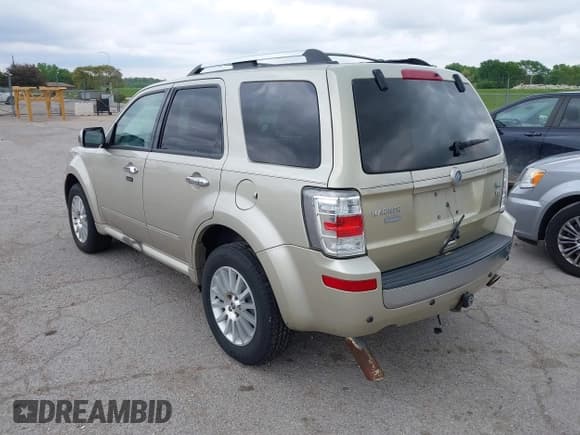 ✅ 2010 Mercury Mariner Premier • VIN: 4M2CN8HG6AKJ03051 • Lot: 42176596. Listed on IAAI with 154,041 mi. Free auction sales archive from the USA and detailed vehicle history report at DreamBid. Image 3.