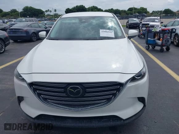 ✅ 2021 Mazda CX-9 Sport • VIN: JM3TCABY9M0512673 • Лот: 43086942. Опубликован ранее на IAAI с пробегом 21 942 миль. Бесплатный доступ к архиву аукционных продаж из США и подробный отчёт об истории автомобиля на DreamBid. Изображение 13.