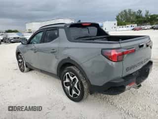 2022 Hyundai Santa Cruz Limited z VIN 5NTJEDAF5NH029165, wystawiony jako Copart lot #81613214 z przebiegiem 22 023 mil mil oraz Szkoda całkowita • Salvage title. Historia ofert i sprzedaży dostępna na DreamBid. Obrazek 2.