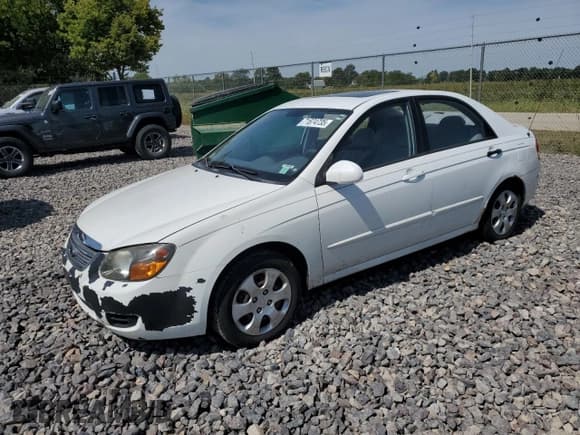 ✅ 2009 Kia Spectra EX • VIN: KNAFE221595597074 • Lot: 71874735. Listed on Copart with 204,954 mi. Free auction sales archive from the USA and detailed vehicle history report at DreamBid. Image 1.