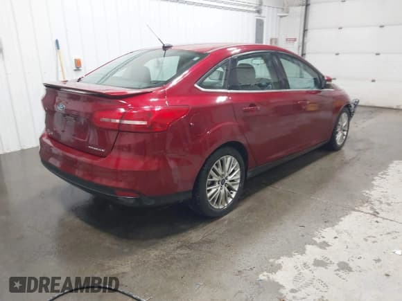 ✅ 2017 Ford Focus Titanium • VIN: 1FADP3J26HL238966 • Lot: 43818466. Listed on IAAI with 35,572 mi. Free auction sales archive from the USA and detailed vehicle history report at DreamBid. Image 4.