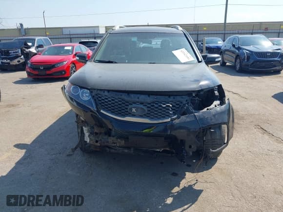 ✅ 2013 Kia Sorento LX • VIN: 5XYKT4A26DG356718 • Lot: 43342184. Listed on IAAI with 126,698 mi. Free auction sales archive from the USA and detailed vehicle history report at DreamBid. Image 6.