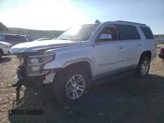 2019 Chevrolet Tahoe LT z VIN 1GNSKBKC2KR287661, wystawiony jako Copart lot #71233305 z przebiegiem 116 957 mil mil oraz Szkoda całkowita • Salvage title. Historia ofert i sprzedaży dostępna na DreamBid. Obrazek 1.