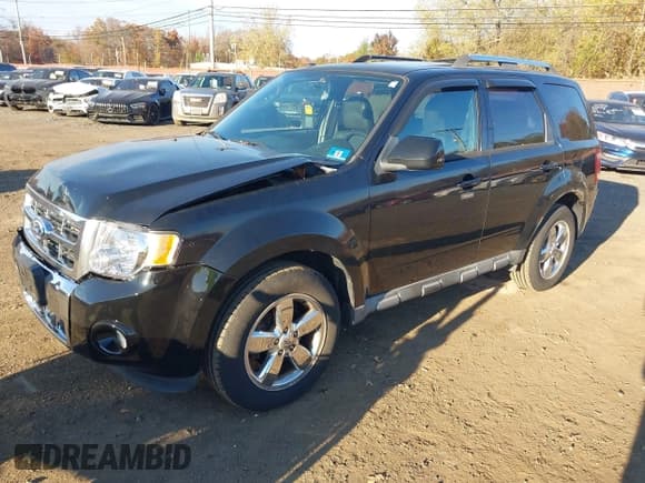 ✅ 2010 Ford Escape Limited • VIN: 1FMCU9EGXAKB80035 • Lot: 43565237. Listed on IAAI with 156,901 mi. Free auction sales archive from the USA and detailed vehicle history report at DreamBid. Image 2.