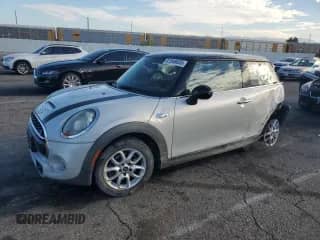 2015 MINI Hardtop S with VIN WMWXP7C52FT740387, listed as a Copart auction lot 81548635 with 132,666 mi miles and Salvage title. Bid and sale history available at DreamBid. Image 1.