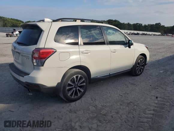 2018 Subaru Forester Touring z VIN JF2SJGWC9JH593863, wystawiony jako Copart lot #65283225 z przebiegiem 50 130 mil mil oraz Szkoda całkowita • Salvage title. Historia ofert i sprzedaży dostępna na DreamBid. Obrazek 3.