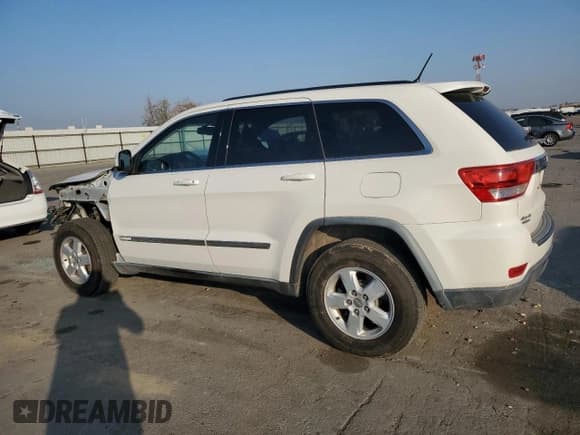 ✅ 2012 Jeep Grand Cherokee Laredo • VIN: 1C4RJFAG6CC189789 • Lot: 89879065. Wystawiony na Copart z przebiegiem 152 796 mil. Bezpłatny archiwum sprzedaży aukcyjnych z USA i szczegółowy raport historii pojazdu na DreamBid. Zdjęcie 2.