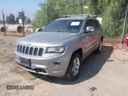 ✅ 2014 Jeep Grand Cherokee Overland • VIN: 1C4RJFCM4EC413468 • Lot: 43396176. Listed on IAAI with 112,235 mi. Free auction sales archive from the USA and detailed vehicle history report at DreamBid. Image 2.