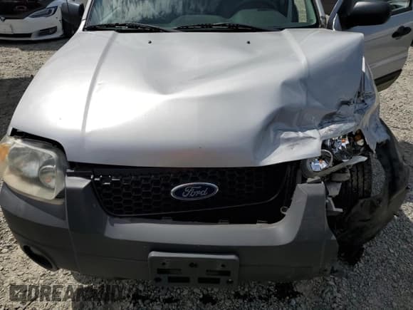 ✅ 2006 Ford Escape Hybrid • VIN: 1FMYU96H56KA48353 • Lot: 63620365. Listed on Copart with 165,223 mi. Free auction sales archive from the USA and detailed vehicle history report at DreamBid. Image 12.