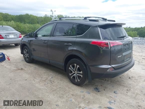 ✅ 2018 Toyota RAV4 LE • VIN: JTMBFREV9JJ742196 • Lot: 42242296. Listed on IAAI with 97,479 mi. Free auction sales archive from the USA and detailed vehicle history report at DreamBid. Image 3.