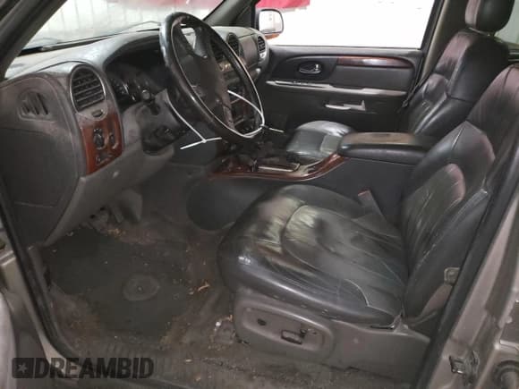 ✅ 2003 GMC Envoy SLT • VIN: 1GKET16S336227507 • Lot: 57172185. Listed on Copart with 187,479 mi. Free auction sales archive from the USA and detailed vehicle history report at DreamBid. Image 7.