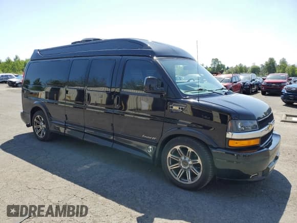 ✅ 2018 Chevrolet Express Cargo • VIN: 1GCWGBFG5J1242705 • Lot: 55627615. Listed on Copart with 77,611 mi. Free auction sales archive from the USA and detailed vehicle history report at DreamBid. Image 4.