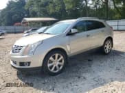 ✅ 2014 Cadillac SRX Performance Collection • VIN: 3GYFNCE34ES518056 • Lot: 70189705. Wystawiony na Copart z przebiegiem 180 663 mil. Bezpłatny archiwum sprzedaży aukcyjnych z USA i szczegółowy raport historii pojazdu na DreamBid. Zdjęcie 1.