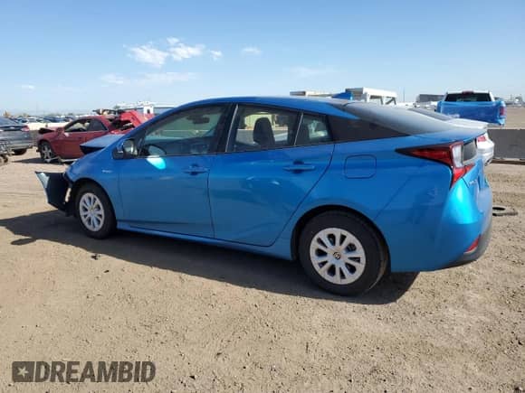 2021 Toyota Prius L Eco с VIN JTDKAMFU1M3143809, выставлен на аукционе Copart как лот 64057345 с пробегом 130 260 миль миль и Списание • Salvage title. История ставок и продаж доступна на DreamBid. Изображение 2.