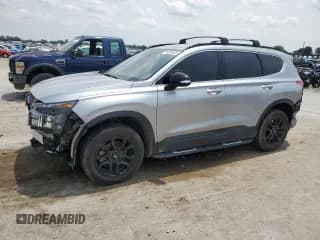 ✅ 2023 Hyundai Santa Fe XRT • VIN: 5NMS6DAJ5PH513003 • Лот: 59324645. Опубликован ранее на Copart с пробегом 25 083 миль. Бесплатный доступ к архиву аукционных продаж из США и подробный отчёт об истории автомобиля на DreamBid. Изображение 1.