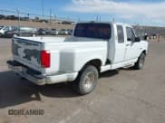 ✅ 1993 Ford F-150 • VIN: 1FTEX14H5PKA70504 • Lot: 41700760. Listed on IAAI with 208,794 mi. Free auction sales archive from the USA and detailed vehicle history report at DreamBid. Image 4.