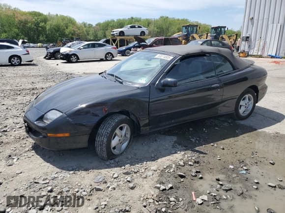 ✅ 1998 Pontiac Sunfire • VIN: 4G2JB32T1WB201350 • Lot: 53074805. Listed on Copart with 128,486 mi. Free auction sales archive from the USA and detailed vehicle history report at DreamBid. Image 1.