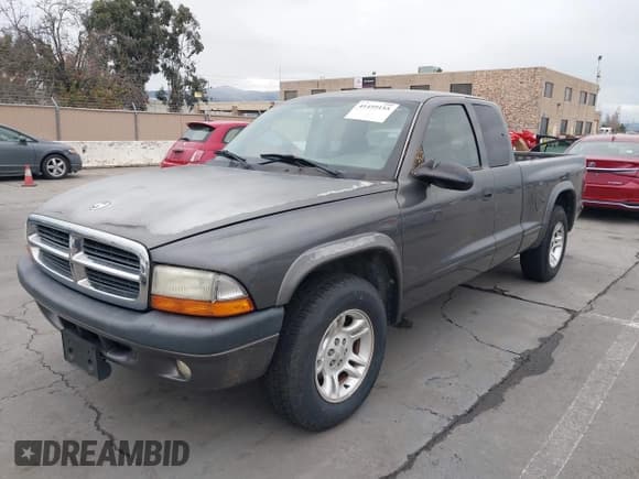 ✅ 2004 Dodge Dakota Sport • VIN: 1D7GL32KX4S690507 • Lot: 41459155. Wystawiony na IAAI z przebiegiem 200 646 mil. Bezpłatny archiwum sprzedaży aukcyjnych z USA i szczegółowy raport historii pojazdu na DreamBid. Zdjęcie 6.