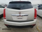 ✅ 2013 Cadillac SRX Luxury Collection • VIN: 3GYFNCE32DS647198 • Lot: 74796014. Wystawiony na Copart z przebiegiem 58 537 mil. Bezpłatny archiwum sprzedaży aukcyjnych z USA i szczegółowy raport historii pojazdu na DreamBid. Zdjęcie 6.