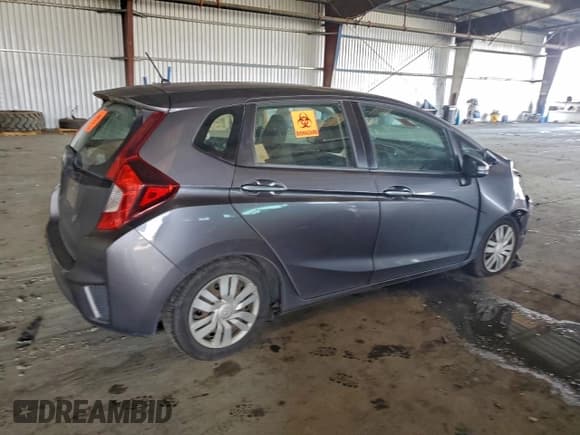 ✅ 2015 Honda Fit LX • VIN: 3HGGK5G53FM707012 • Lot: 94560505. Listed on Copart with Not provided. Free auction sales archive from the USA and detailed vehicle history report at DreamBid. Image 3.