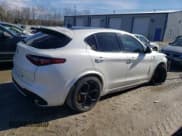 ✅ 2018 Alfa Romeo Stelvio • VIN: ZASFAKEV3J7C18974 • Lot: 46102715. Listed on Copart with 74,980 mi. Free auction sales archive from the USA and detailed vehicle history report at DreamBid. Image 3.