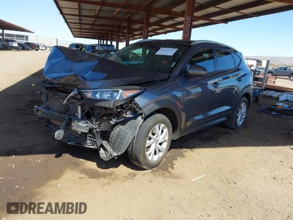 2019 Hyundai Tucson Value z VIN KM8J33A46KU860829, wystawiony jako IAAI lot #42592727 z przebiegiem 81 703 mil mil oraz . Historia ofert i sprzedaży dostępna na DreamBid. Obrazek 2.